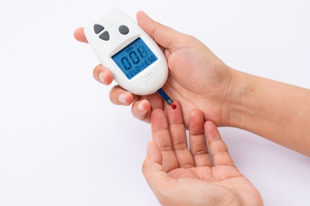 FOTO GLUCOMETEN BLOEDSUIKER METEN